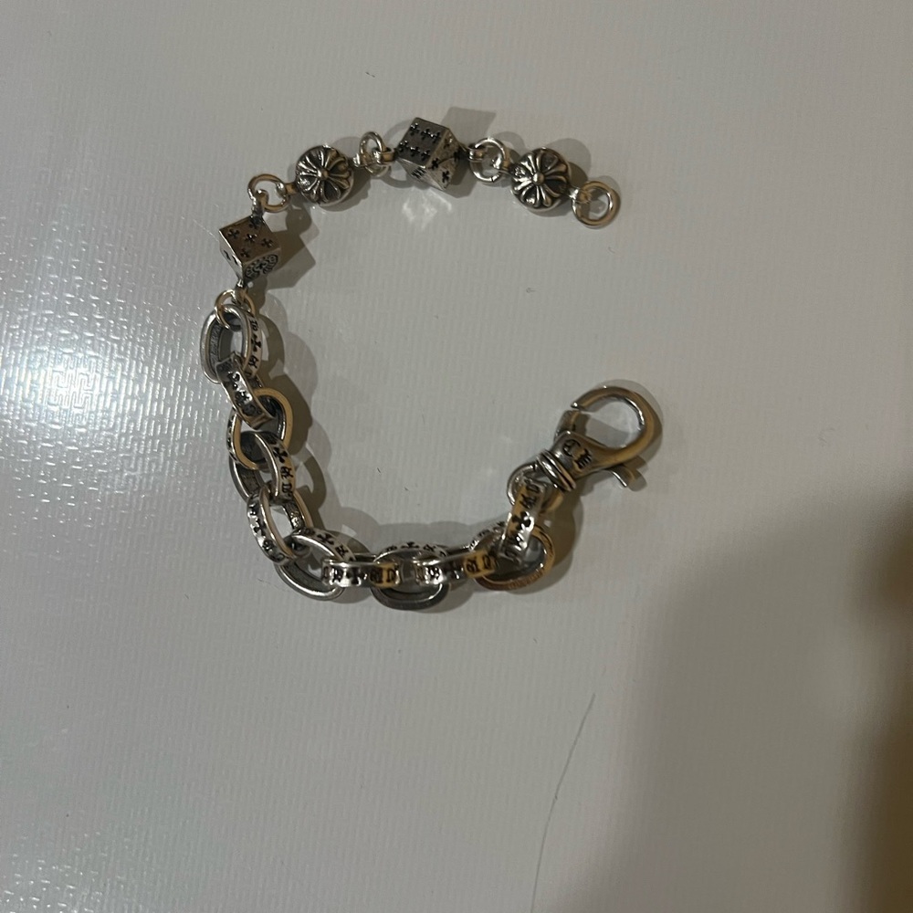 Silver Link Charm Bracelet with Floral Accents